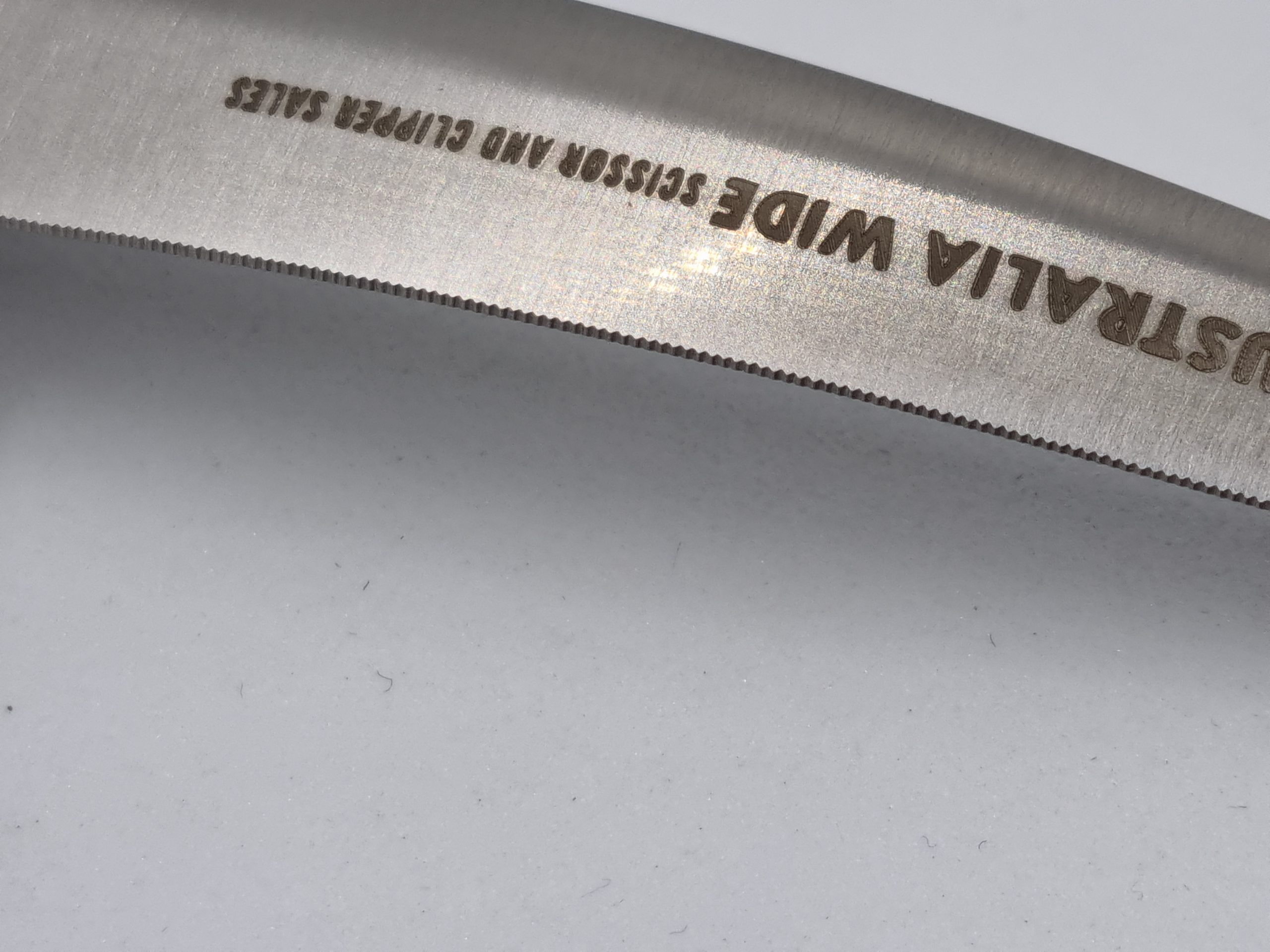 Curved Serrated Edge Offset Handle 7 inch